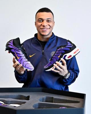 Kylian Mbappé with Air Max Plus-inspired Nike Football Boots. Photo via Nike.