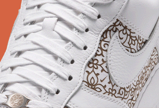 Nike Air Force 1 '07 LV8 "Laser" in an orante, "White/Marrakesh/Picante Red/Light Orewood Brown" color scheme.