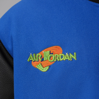Jordan Flight Space Jam Men's Varsity Jacket "30th Anniversary" (SKU: IX3095-497). Photo via Nike.