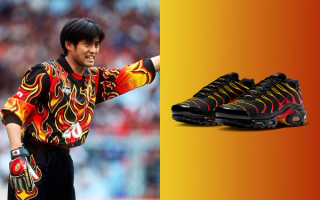 Nike Air Max Plus in a "Black/University Gold/University Red" color scheme.