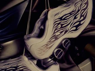 Campaign visual for the HELLSTAR x adidas Megaride S2 "White/Black" sneaker. Photo via adidas.
