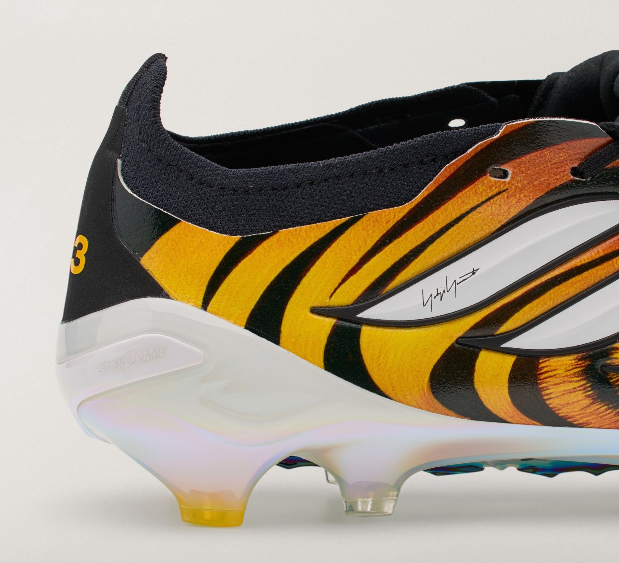 Men's adidas Y-3 Predator Elite FT FG "Tiger" (SKU: KK4189). Photo via adidas.
