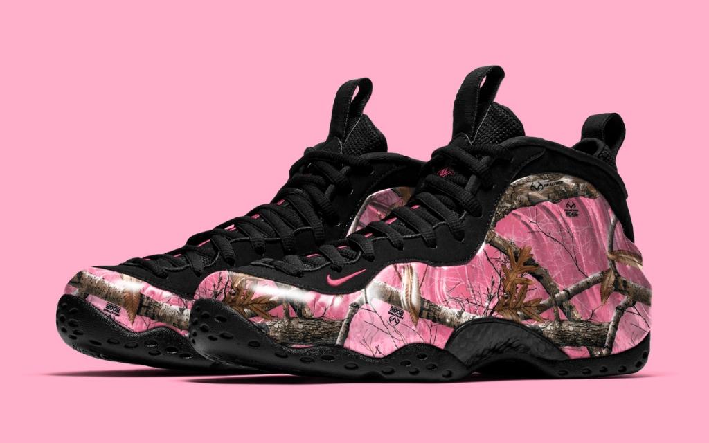 Nike Foamposite One in Pink Realtree camo colorway, showing the signature one-piece foam upper with camouflage patterning