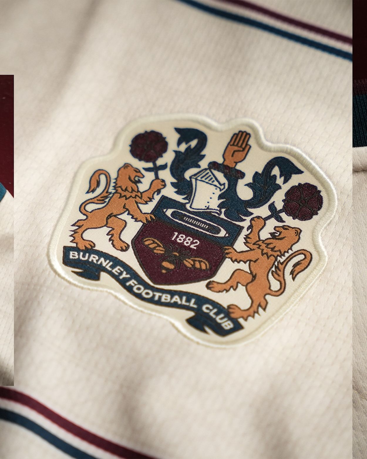 Burnley 26/27 Away Kit Club Crest. Photo via Burnley FC.