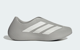 Adidas Purechill recovery slip-on in a "Grey Two/Grey One/Core Black" color scheme.