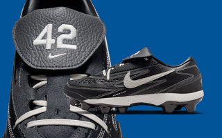 Jackie Robinson-inspired Nike Diamond Standout baseball cleats in a black-and-off-white color scheme.