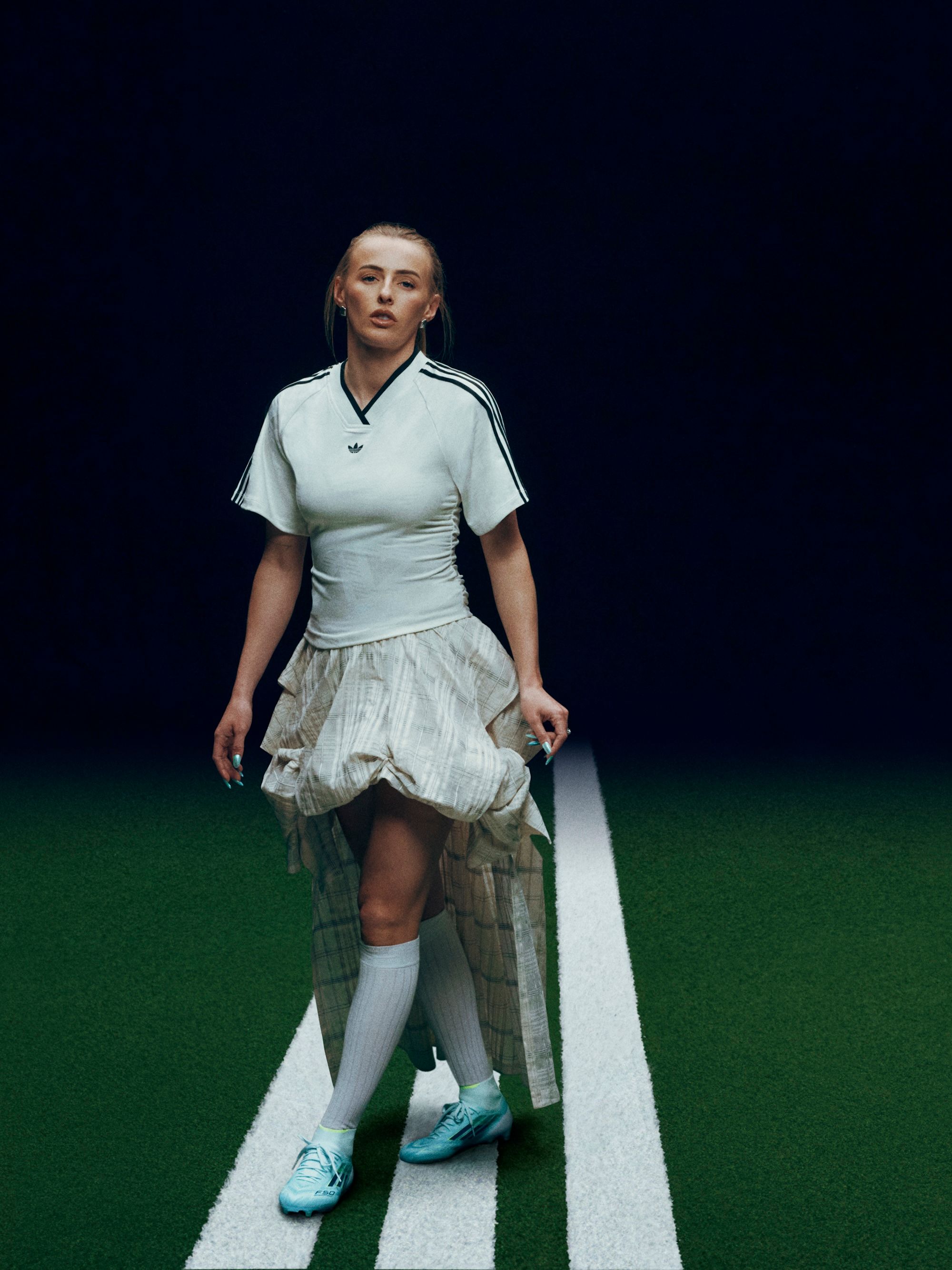 Chloe Kelly join adidas as F50 SPARKFUSION footballer. Photo via adidas.
