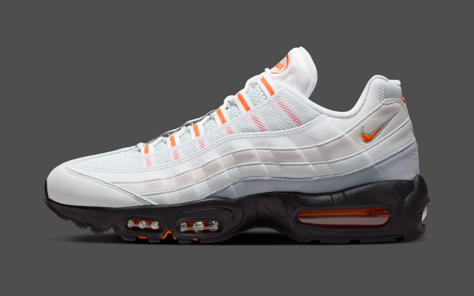 nike air max 95 tm trainers in white and orange