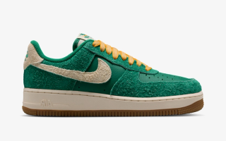 Nike Air Force 1 Low '07 "Game Day" sneaker in a "Malachite/University Gold/Gum Medium Brown/Coconut Milk" color scheme.