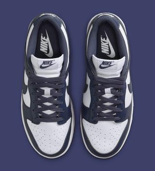 Top-down view of Women's Nike Dunk Low covered in a "White/Thunder Blue" color scheme.