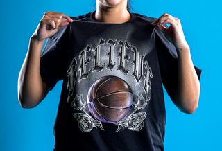 Playa Society x Overtime "BELIEVE" Graphic T-Shirt Worn By Jessie Moses. Photo via Overtime.