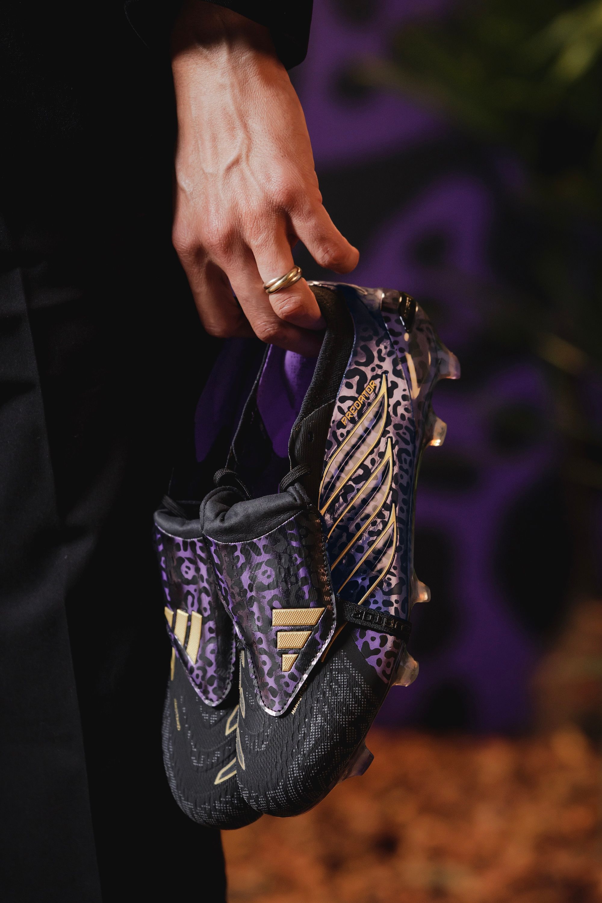 Kaká holding his jaguar-inspired adidas Predator 26 FT Elite FG (SKU: JR4433). Photo via adidas.