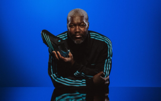 Cissé in promo for the adidas F50 Spider Elite FG remake in a "Blue Rush/Sky Rush/Tech Indigo" color scheme.