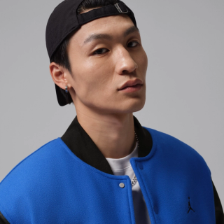 Jordan Flight Space Jam Men's Varsity Jacket "30th Anniversary" (SKU: IX3095-497). Photo via Nike.