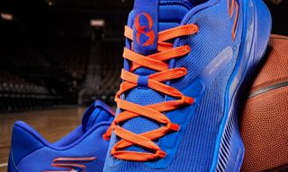 New York Knicks player OG Anunoby's "NYC Blue" Skechers Basketball SKX_Nexus shoe in a blue-and-orange color scheme, available for pre-order.