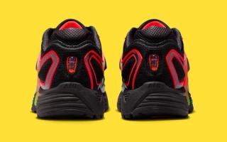 Heel angle of Nike's Pegasus Wave in a "Black/Bright Crimson/Green Strike" color scheme.
