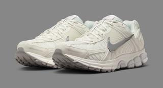Nike Vomero 5 sneaker in a "Sail/Grey/Metallic Silver" color scheme.