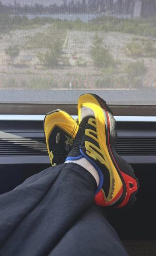 On-Foot Look: Kith x Salomon XT-EVO "Yellow." Photo via Ronnie Fieg.