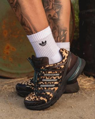 GloRilla wearing "Leopard" adidas AdiStar Control 5.