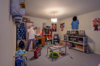 Recreation of NIGO's bedroom growing up. Photo by Luke Hayes/GQ.