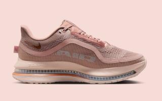 Medial angle of Nike Running's Pegasus Premium in a "Particle Pink/Rose Gold" color scheme