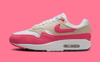 The Nike nike air wild white hair black color background Appears in “Aster Pink” 