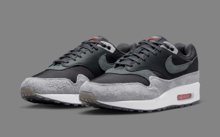 The Nike Air Max 1 Surfaces in a Dark Smoke Grey With Crimson Detailing