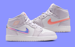 Kids' Air Jordan 1 Mid in a "Barely Grape" color scheme featuring iridescent swooshes.