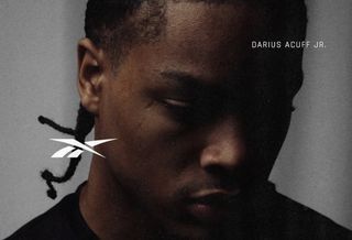 Darius Acuff Jr. in a Reebok Basketball announcement photo.