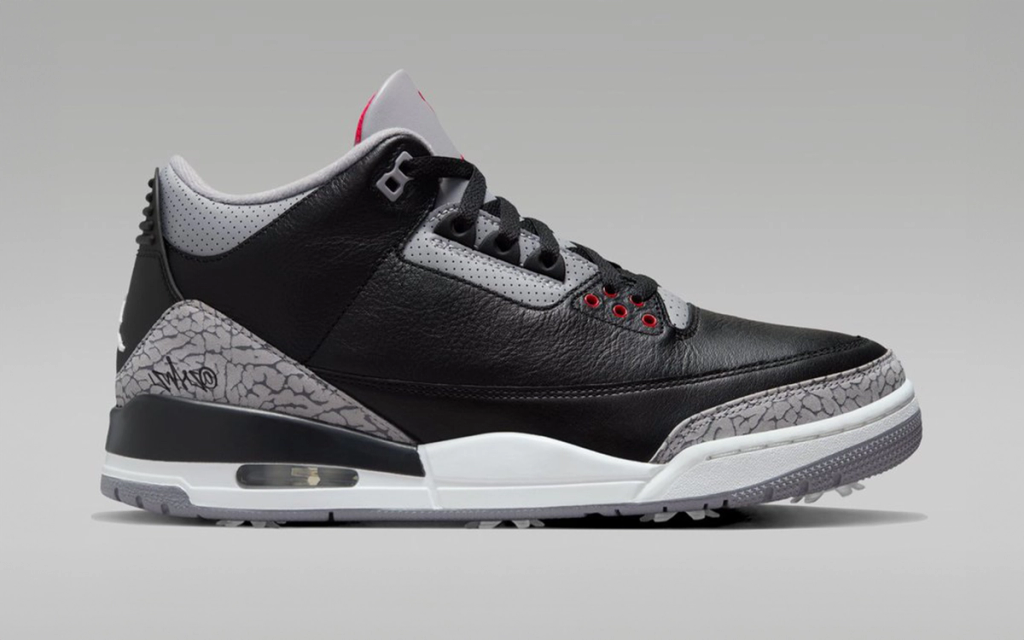 Jordan Air Jordan 3 Black Cement golf shoe adaptation featuring elephant print paneling and visible Air unit in black and cement colorway