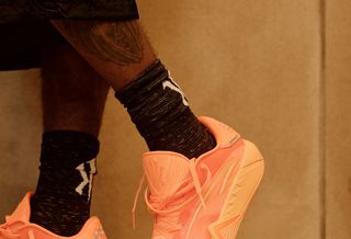 Kyrie Irving wearing his ANTA KAI 3 "Calcite" basketball sneaker.