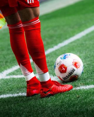 Michael Olise in a red pair of the Hypervenom III. Photo via Michael Olise.