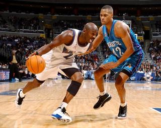 Michael Jordan wearing the original Air Jordan 17 (2002). Photo by MITCHELL LAYTON/NBAE/GETTY IMAGES.