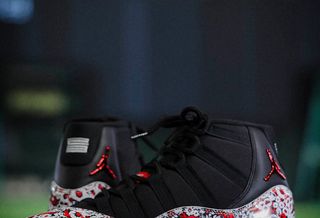 Jordan Brand's special-edition Air Jordan 11 baseball cleats for Japan's Yomiuri Giants, featuring Nomarhythm Textile pattern.