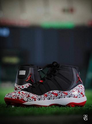 Jordan Brand's special-edition Air Jordan 11 baseball cleats for Japan's Yomiuri Giants, featuring Nomarhythm Textile pattern.
