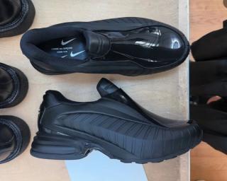 COMME des GARÇONS HOMME PLUS Nike Air Max Dolce in "Black."