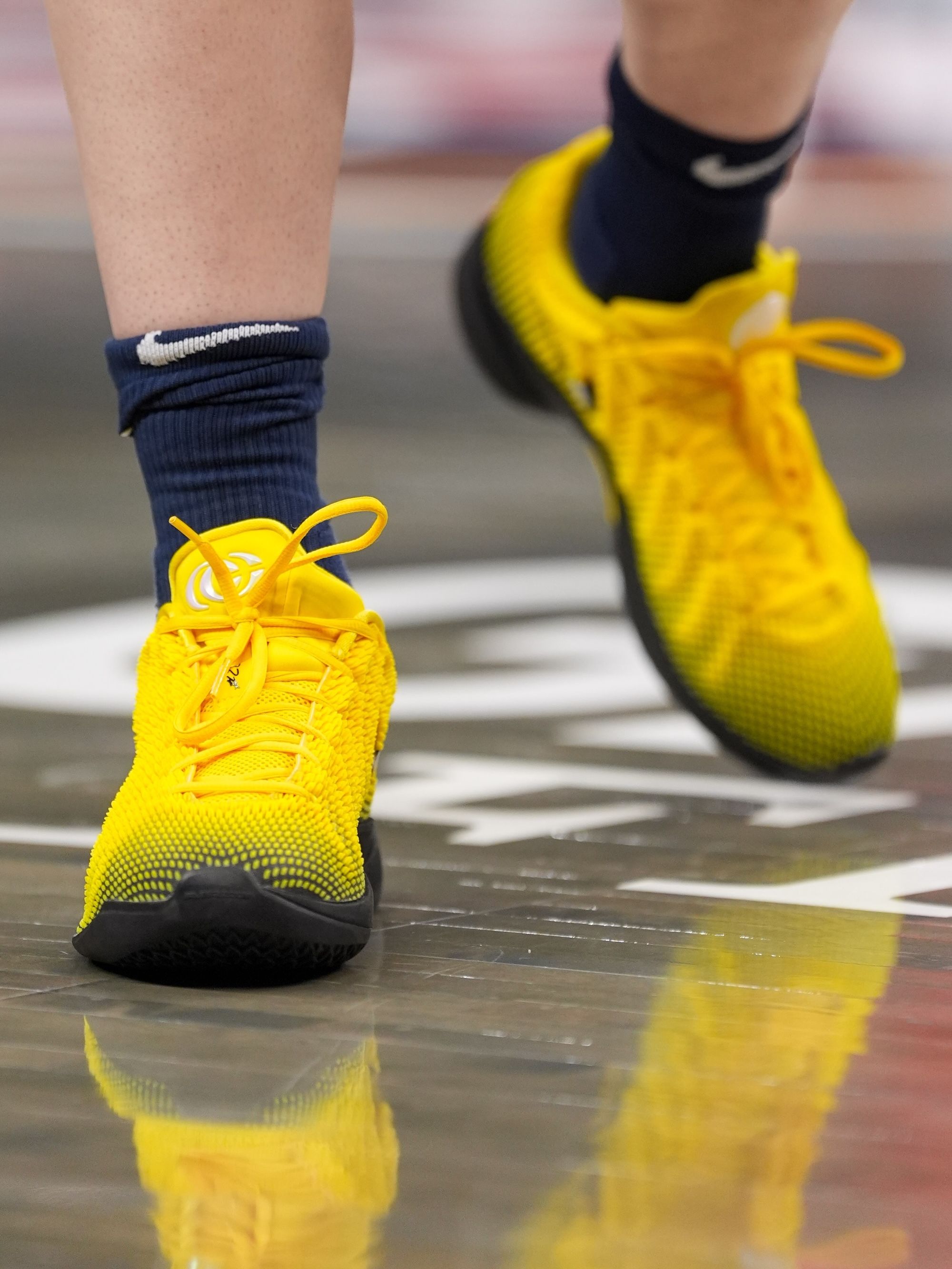 Caitlin Clark wearing Iowa Hawkeyes-inspired Nike Caitlin 1. Photo via Indiana Fever.