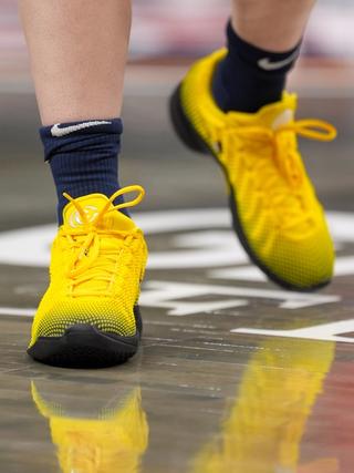 Caitlin Clark wearing Iowa Hawkeyes-inspired Nike Caitlin 1. Photo via Indiana Fever.