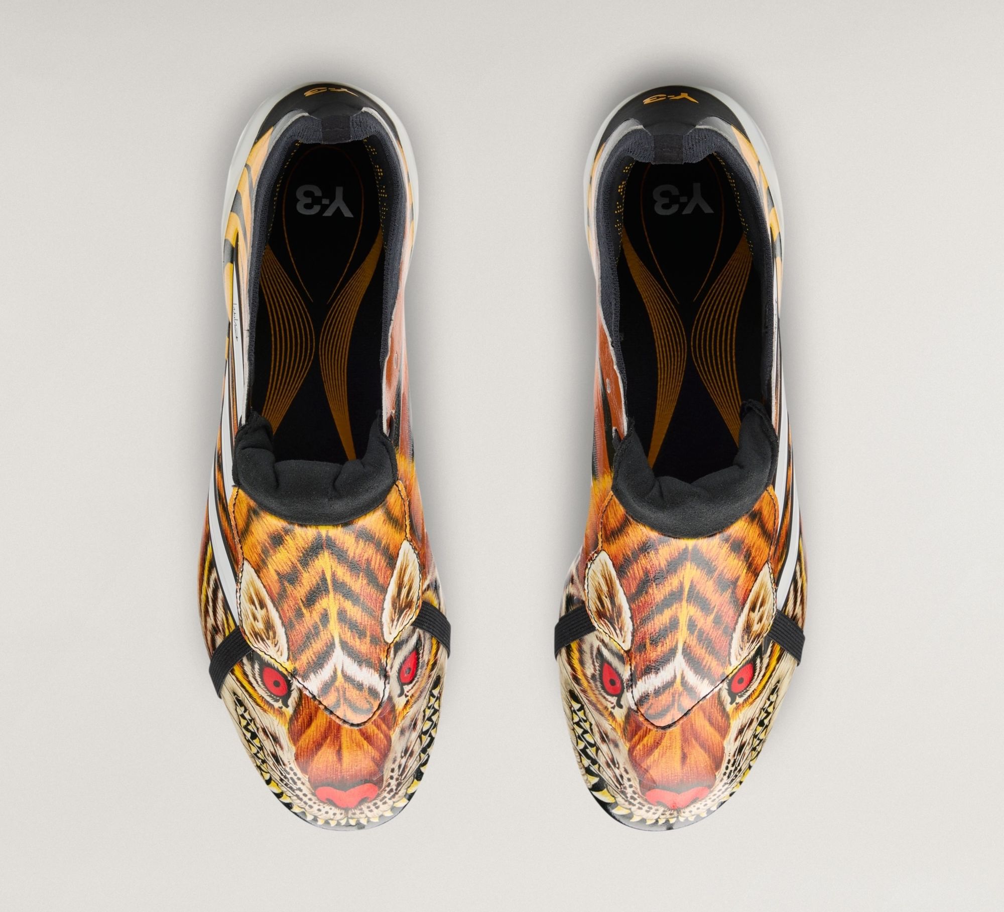 Men's adidas Y-3 Predator Elite FT FG "Tiger" (SKU: KK4189). Photo via adidas.