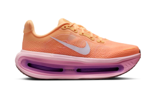 Nike Running's Vomero Premium in a "Tangerine Tint" color scheme.