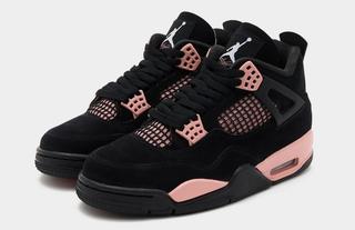 Women's Air Jordan 4 "Pink Thunder" retro, which features a black nubuck upper and pink accents. Photo via JD Sports.