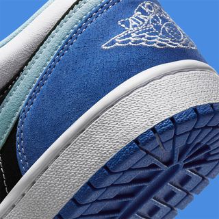 Contrast Stitching Appears on New Black & Blue Jordan 1 Lows | House of ...