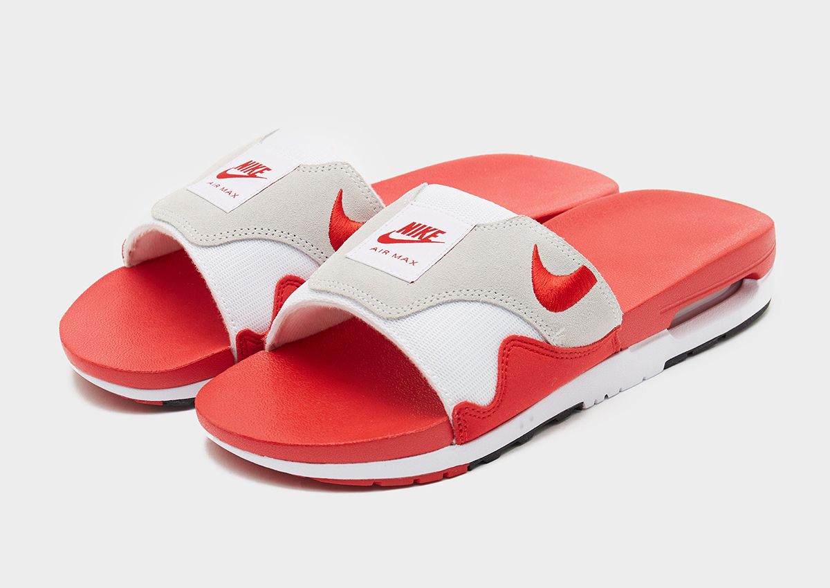 Red and white discount fuzzy nike slides