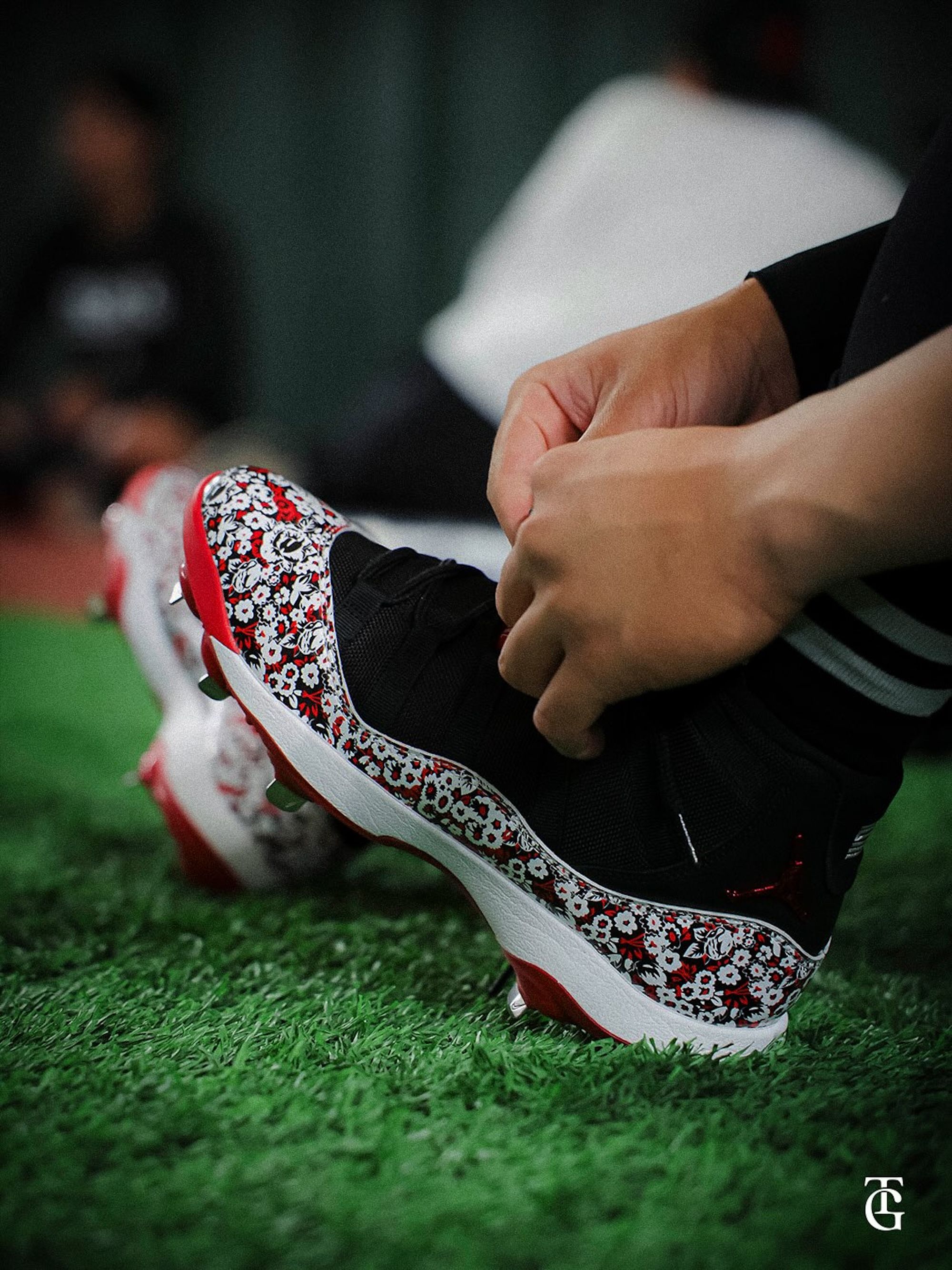 Jordan Brand's special-edition Air Jordan 11 baseball cleats for Japan's Yomiuri Giants, featuring Nomarhythm Textile pattern.