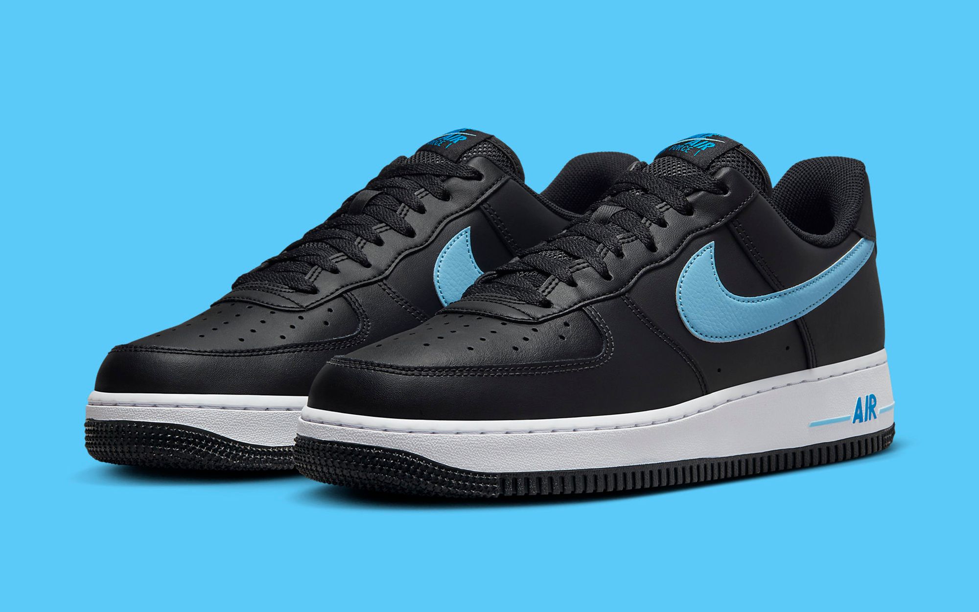 Black nike shoes with blue swoosh fashion