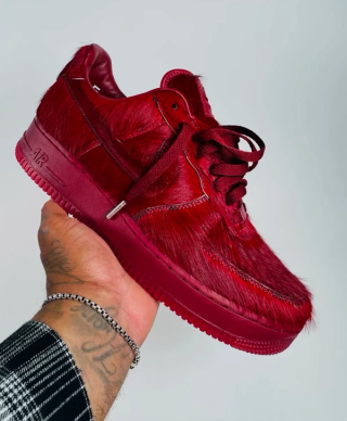 In-Hand: Nike Air Force 1 in a "Team Red" pony hair-covered makeover. Photo via @frankcooker on Instagram.