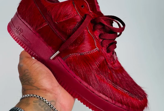 In-Hand: Nike Air Force 1 in a "Team Red" pony hair-covered makeover. Photo via @frankcooker on Instagram.