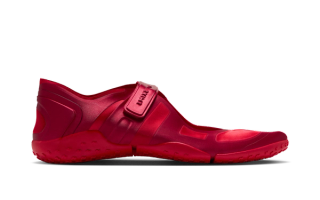NikeSKIMS Rift Satin flat shoe in a "University Red" color scheme.