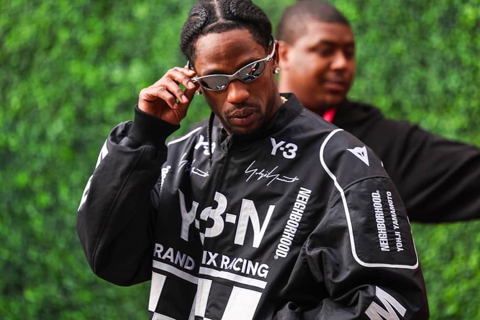 Travis Scott wearing an Adidas Y-3 x NEIGHBORHOOD racing-inspired jacket at the 2025 Las Vegas Grand Prix. Photo by Jayce Illman/Getty Images.