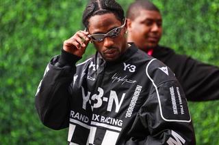Travis Scott wearing an Adidas Y-3 x NEIGHBORHOOD racing-inspired jacket at the 2025 Las Vegas Grand Prix. Photo by Jayce Illman/Getty Images.